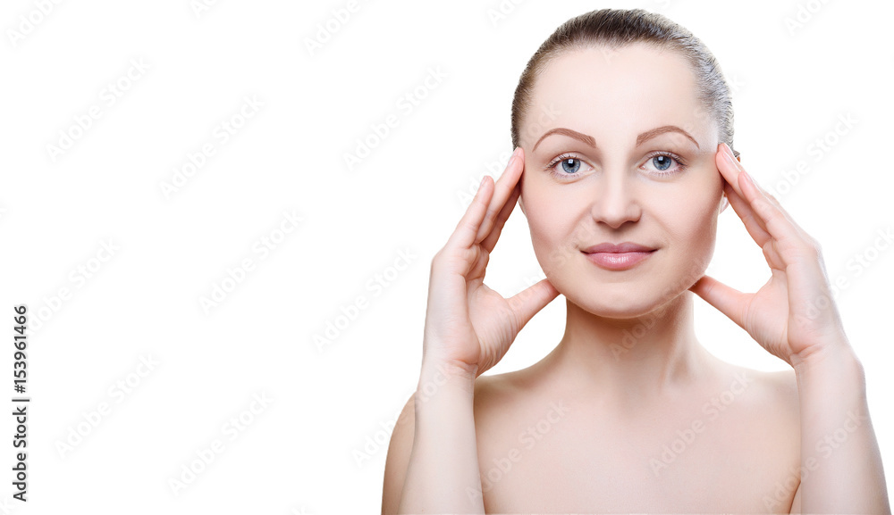 Portrait of a girl with nude make-up with hands near her face isolated on white background. Girl with clean healthy skin on white. Copy space. Beauty model. Nude makeup