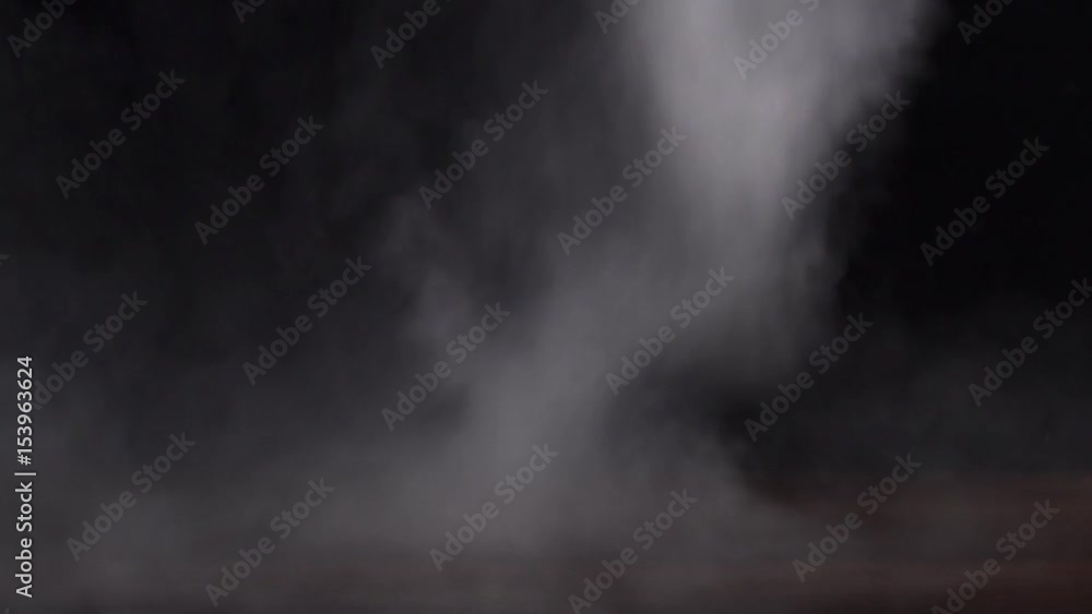 Slow motion, white smoke on the black background Slow motion, white smoke on the black background