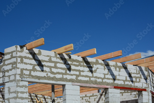Tableau sur toile The wooden structure of the building
