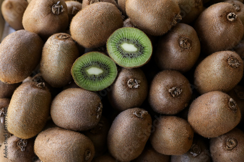 Kiwi fruits on the counter for sale in a vegetable shop.