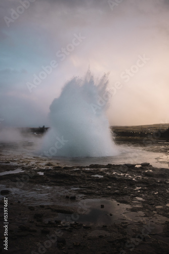 Beautiful geyser valley in Iceland.Erupting geyser