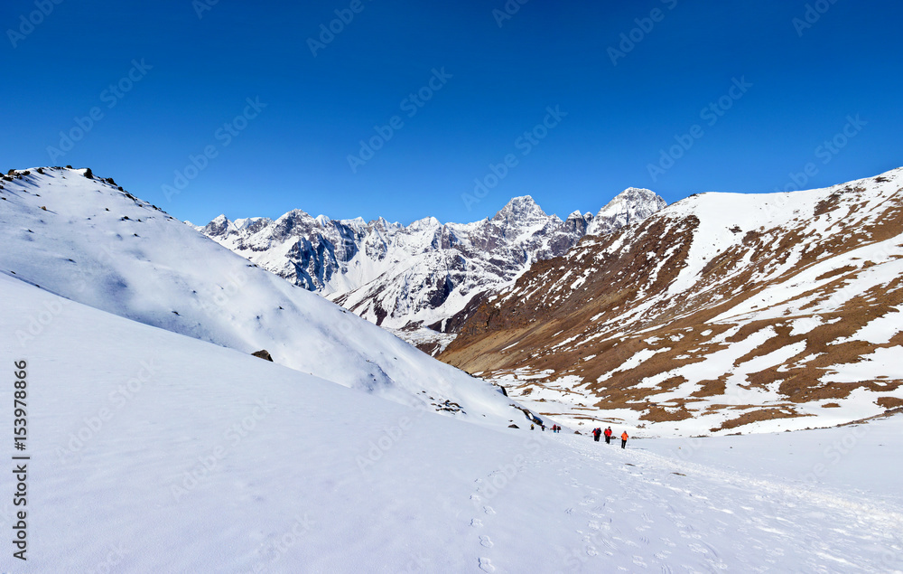 Tourists on the way to Cho-La pass. Trek to Everest basecamp in Himalayan mountains, Nepal.
