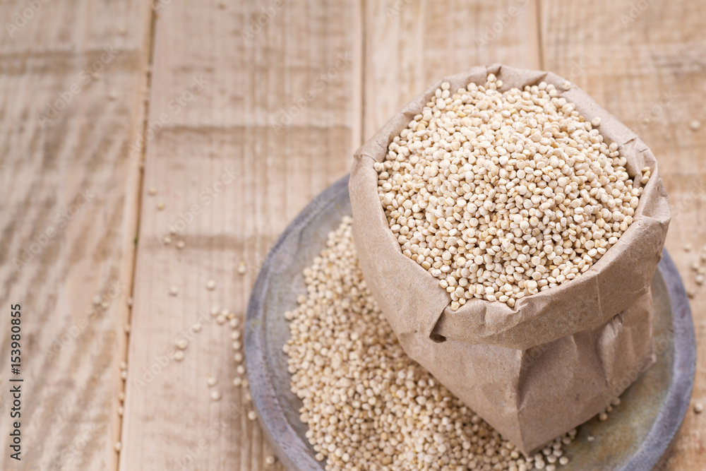 Grains of quinua on wood - Chenopodium quinoa