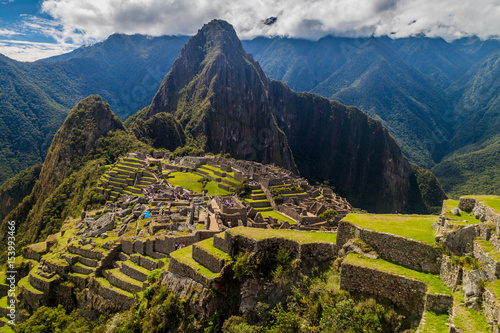 Photography Machu Picchu ruins from above, Wayna Picchu mountain in the background, Peru