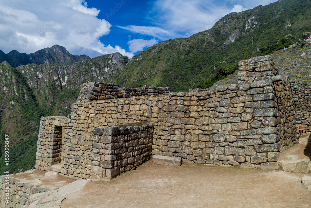 Preserved buildings at Machu Picchu ruins, Peru