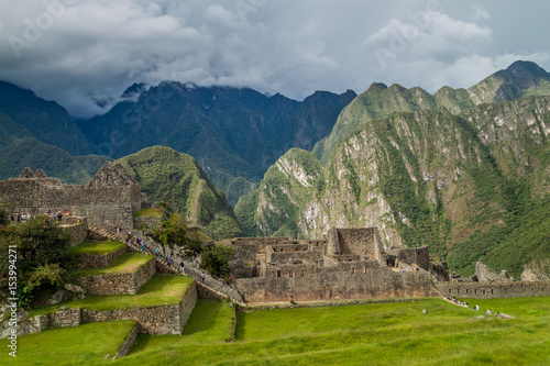 Wallpaper Mural MACHU PICCHU, PERU - MAY 18, 2015: Crowds of visitors at Machu Picchu ruins, Peru. Torontodigital.ca
