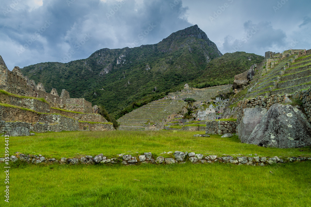 Former agricultural terraces and buildings at Machu Picchu ruins, Peru