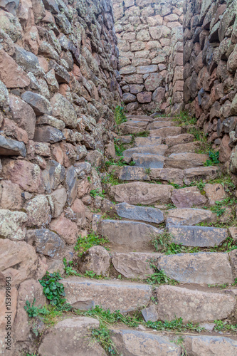 Narrow stairway at Pisac ruins, Peru