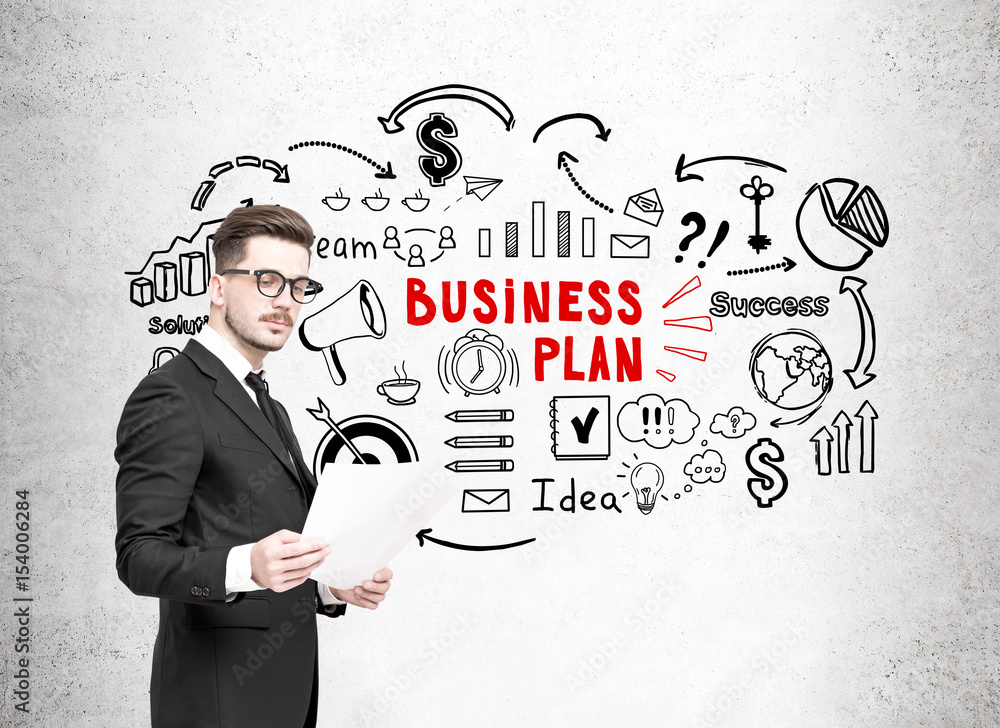 Man with documents and business plan Man with documents and business plan