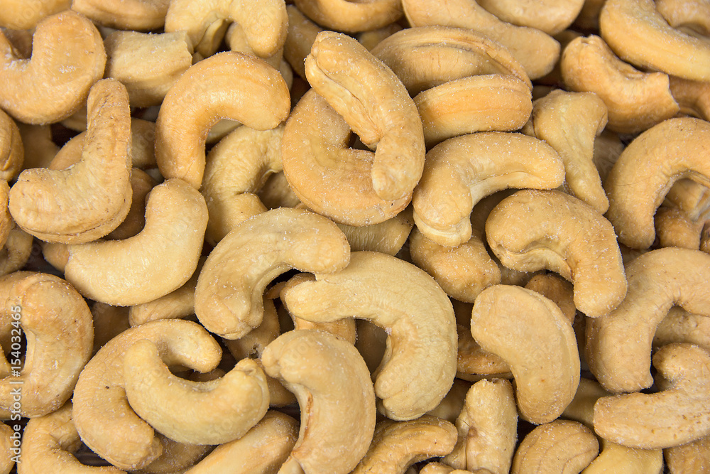 close up of salted cashew pile close up of salted cashew pile