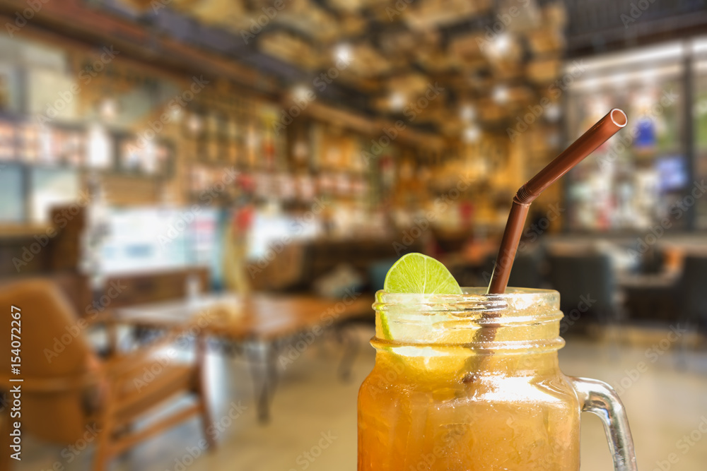 ice tea with slice of lemon in mason jar ice tea with slice of lemon in mason jar