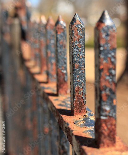 Rusted Iron Railing or Fence with Spikes