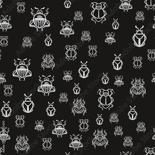 Seamless pattern with white bugs on a black background
