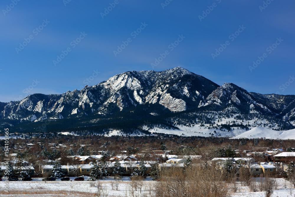 Flatirons Mountains in Boulder, Colorado on a Cold Snowy Winter Day