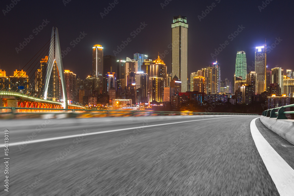 City Empty Road,asphalt road through modern city at night in China.