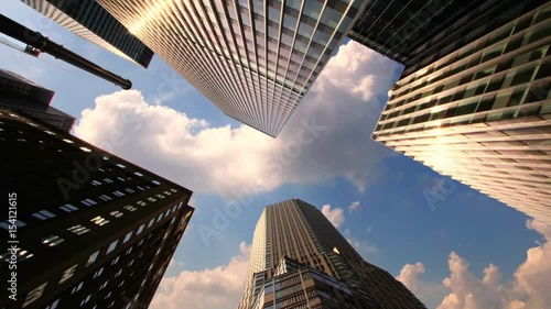 Skyscrapers with Running Clouds