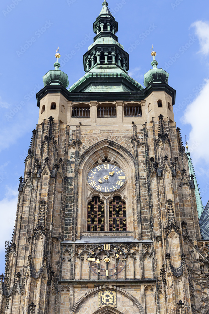 14th century St. Vitus Cathedral , facade, tower with clock, Prague, Czech Republic.