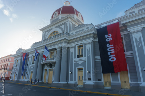 cienfuegos, cuba. City Hall with cuban and part Flags on facade during celebration of 1 january.