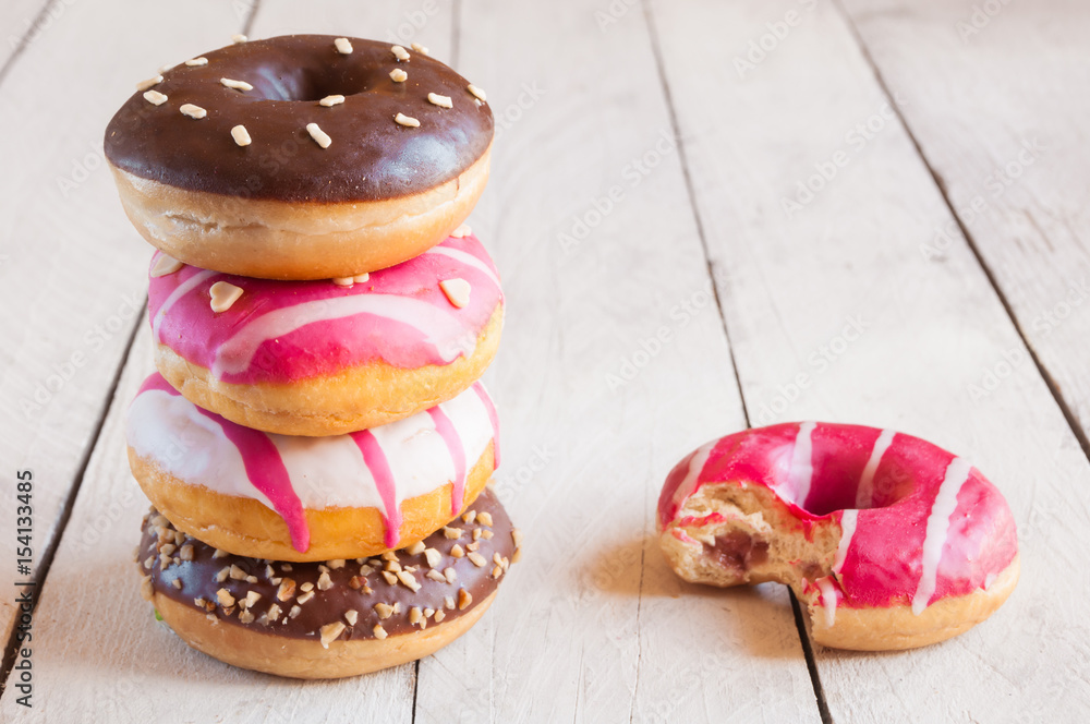 Colorful donuts in a heap Colorful donuts in a heap