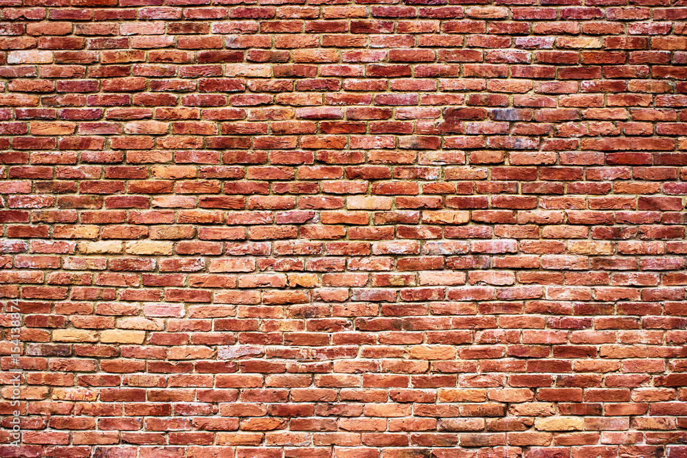 Naklejka premium old brickwork, the background wall of red blocks
