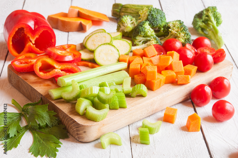 Assorted vegetables on cutting board Assorted vegetables on cutting board