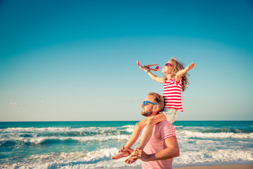 Happy family having fun on summer vacation