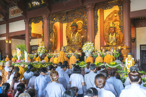 Ho Chi Minh City, Vietnam - May 10th, 2017: Buddhist revered ceremony in temple beautiful architecture, many statues sanctuary express cultural beauty of religious spirituality in Ho Chi Minh, Vietnam