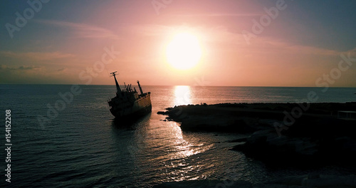  Beautiful seascape with old ship after the accident.