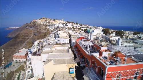 Drone flight over the village of Fira and the caldera, on the Island of Santorini, Cyclades, Greece