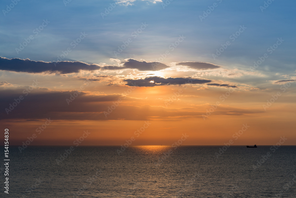 Beauty sunset over seacoast skyline, natural landscape background