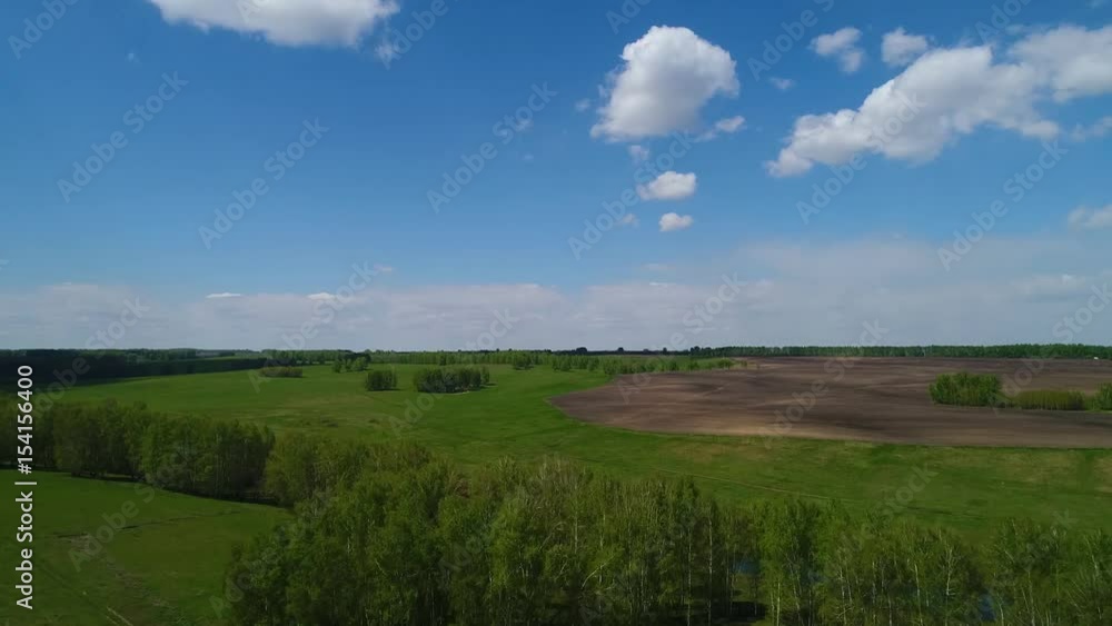 aerial view of ploughed fields and cloud forest of the Siberian landscape aerial view of ploughed fields and cloud forest of the Siberian landscape