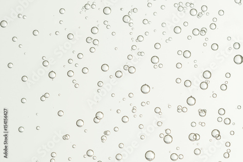 Beautiful champagne bubbles soars over a blurred background