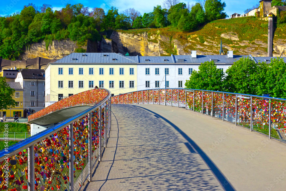 The bridge fence covered with locks in Salzburg