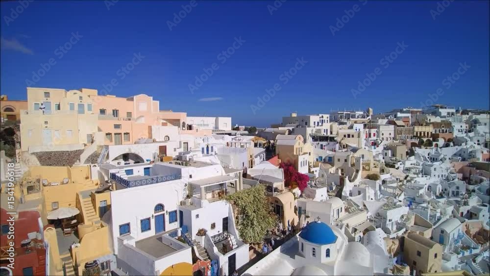 Drone flight over the artist quarter in Oia (Ia), on the Island of Santorini, Cyclades, Greece Drone flight over the artist quarter in Oia (Ia), on the Island of Santorini, Cyclades, Greece