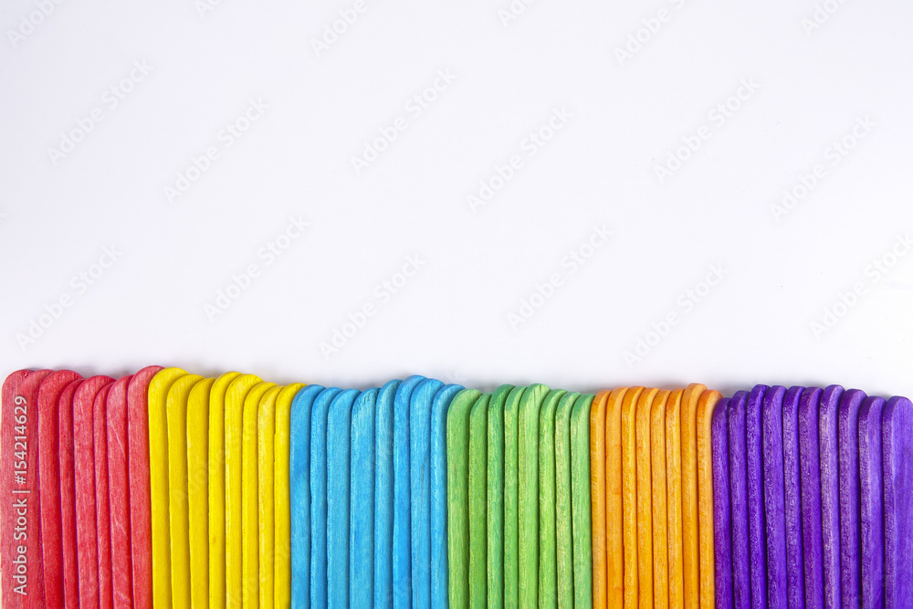 Colourful wooden sticks on white background Colourful wooden sticks on white background
