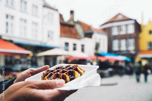 Traditional Belgian dessert, pastry - Belgium tasty waffle with chocolate sauce