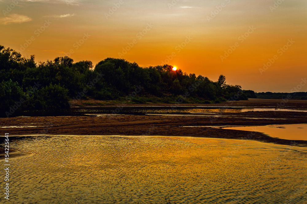 Fototapeta premium river at sunset
