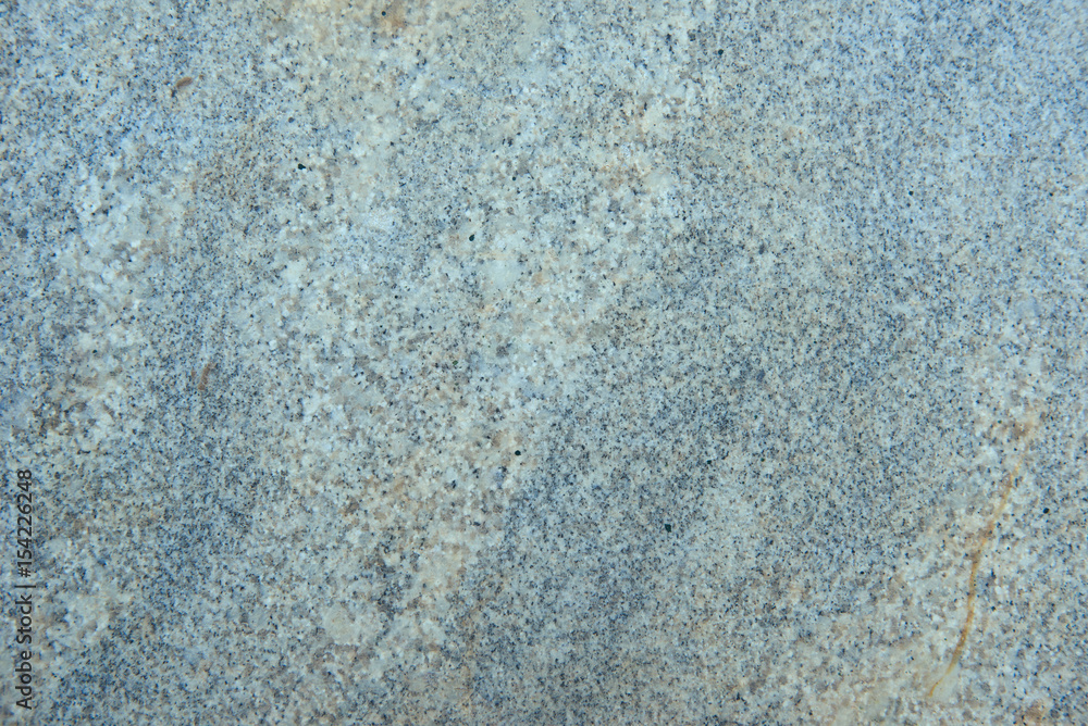 Textured surface of polished granite stone