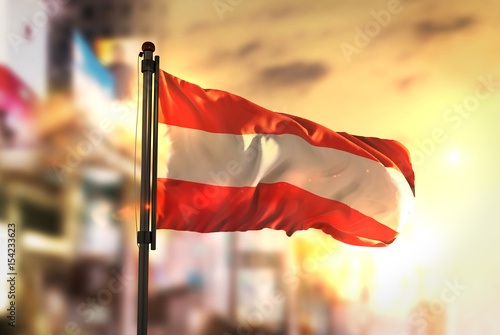 Photography Austria Flag Against City Blurred Background At Sunrise Backlight