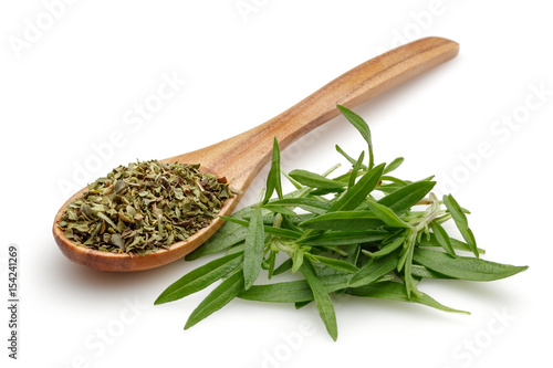 Dried and fresh thyme with wooden spoon