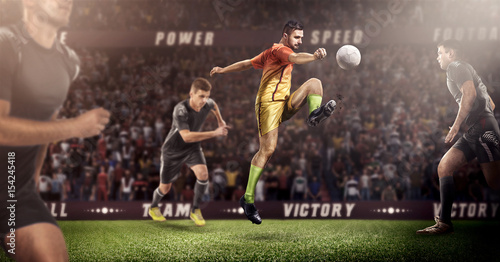 Brutal Soccer action on 3d sport arena. mature players with ball in black and orange uniform © masisyan