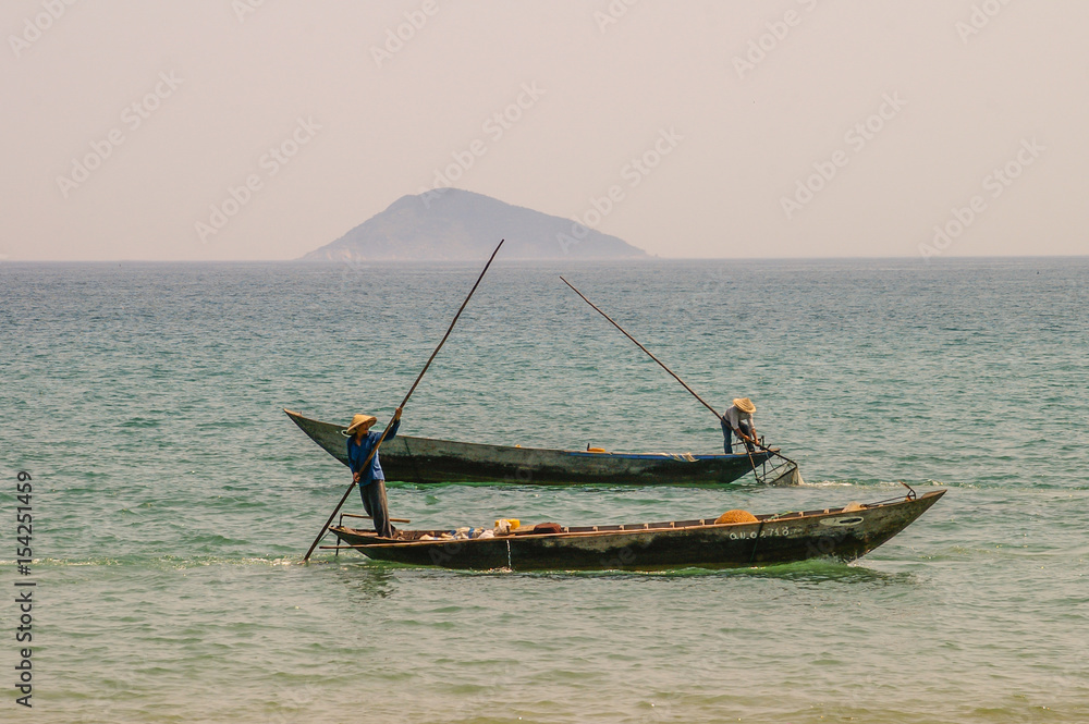 Traditional Vietnamese fishing along the beautiful coastline of Vietnam Traditional Vietnamese fishing along the beautiful coastline of Vietnam