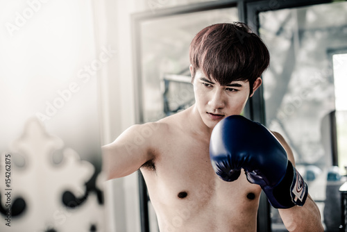 A man boxing training in gym © pom669