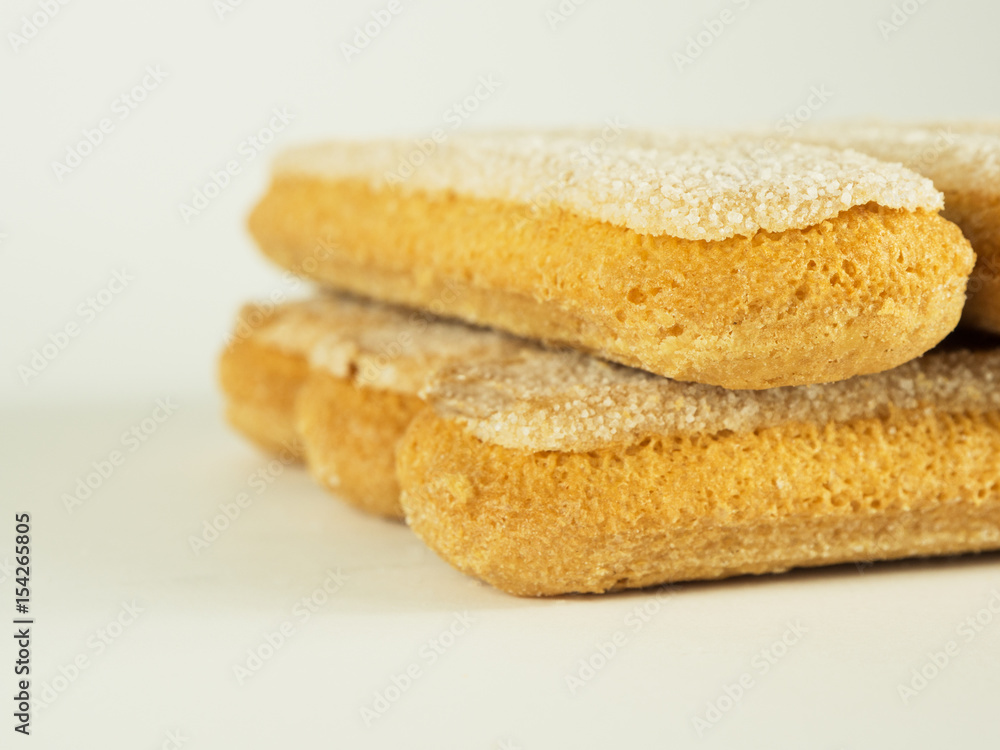 Group of ladyfingers over white background Group of ladyfingers over white background