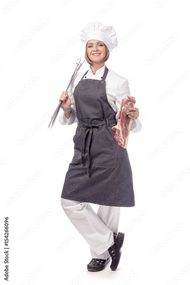 smiling woman professional chef, cook or butcher holding raw meat steak and grill tools isolated on white background. restaurant, dieting, bbq and cooking food concept. grocery advertisement smiling woman professional chef, cook or butcher holding raw meat steak and grill tools isolated on white background. restaurant, dieting, bbq and cooking food concept. grocery advertisement