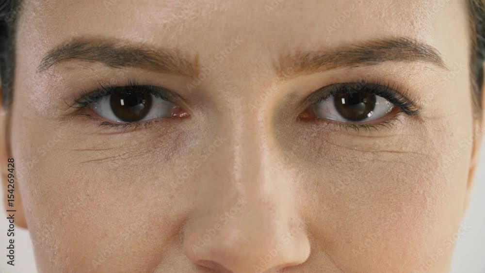 Facial Care. Beautiful Woman Massaging Skin Under Eyes Facial Care. Beautiful Woman Massaging Skin Under Eyes