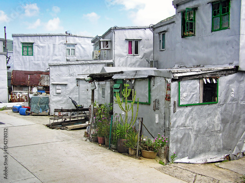 Small silver-painted houses in the fishing village Tai O on the island of Lantau, Hong Kong