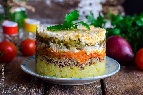 Layered salad with liver and vegetables
