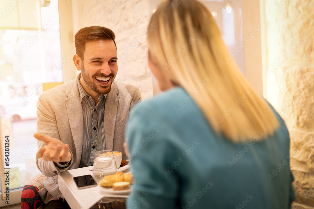 Businesspeople In A Cafe