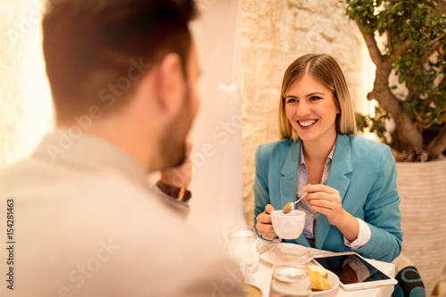 Businesspeople In A Cafe
